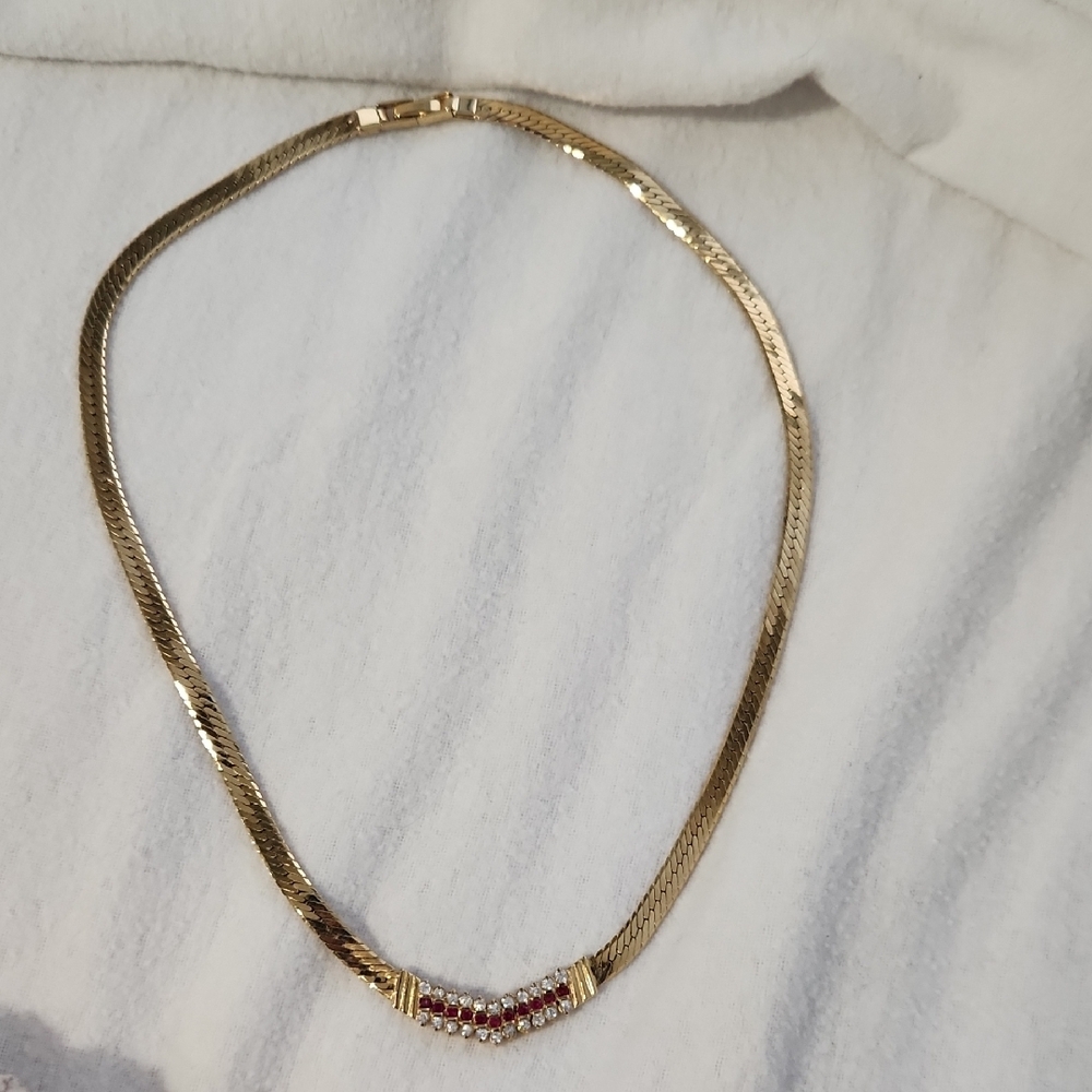 Elegant Gold Necklace with Red Accents